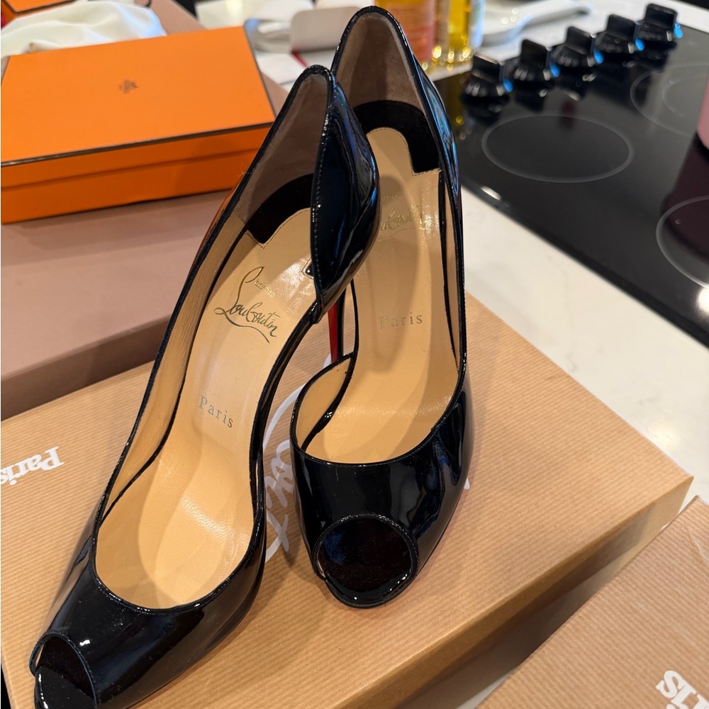 Christian Louboutin Black Patent Leather Pumps with Red Soles